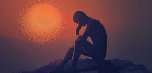 A person reading books and learning on a computer during recovery